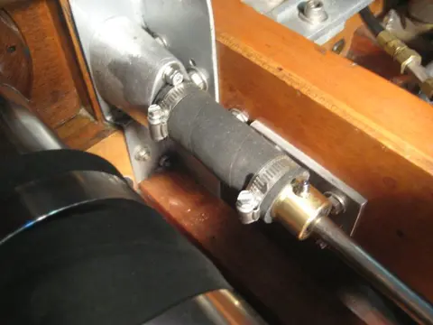 Hot Rod: Cavitation plates: It's a very tight fit, but there's just enough room for the thru hull fitting and cavitati