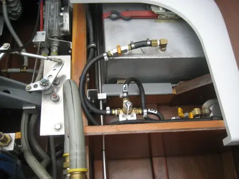 Hot Rod: Cavitation plates: It's a very tight fit, but there's just enough room for the thru hull fitting and cavitati