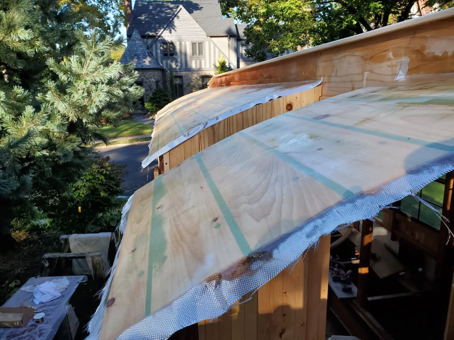 Jersey Girl: As the epoxy-bedded fiberglass cures on both sides of Jersey Girl's roof, it's time to...
