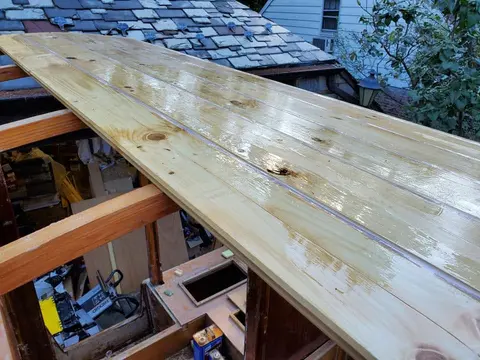 Jersey Girl: Today I finished sealing up the topside grooves between the planks I had installed...