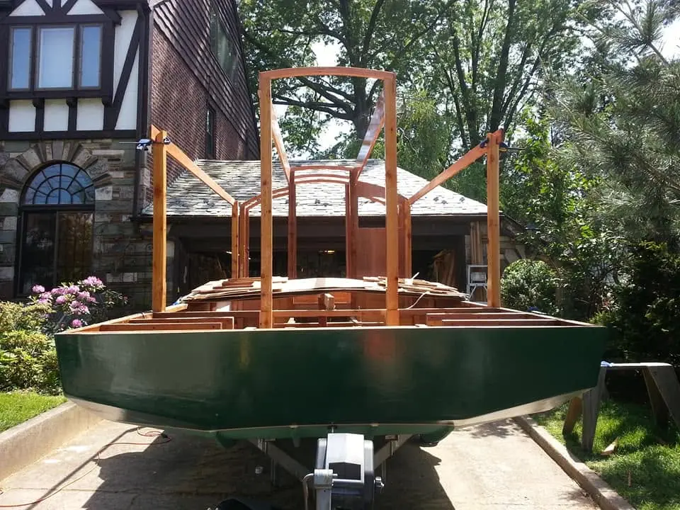 Jersey Girl: Jersey girl now has her two main roof beams and her two side roof beams installed.