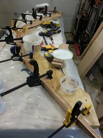 Jersey Girl: I’ve started laying up the first of Jersey Girl’s arched roof beams against the jig I...