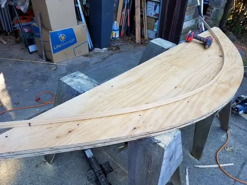 Jersey Girl: Still working on the jig for Jersey Girl's laminated cedar roof beams.