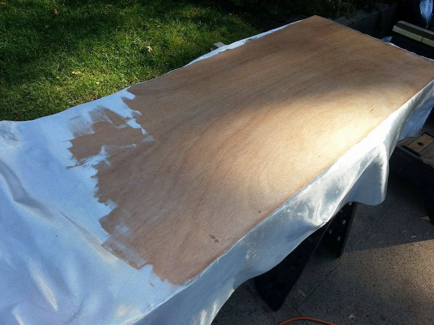 Jersey Girl: Starting to fiberglass the backs of the side panels -- the sheer strakes.
