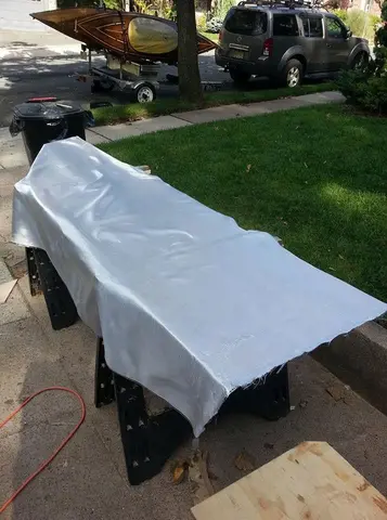 Jersey Girl: Starting to fiberglass the backs of the side panels -- the sheer strakes.