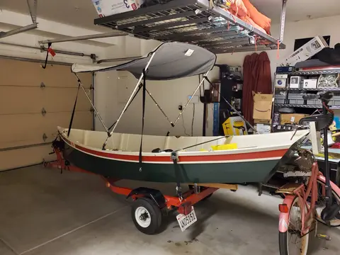 14 Foot Wooden Boat With Electric Motor and a trailer